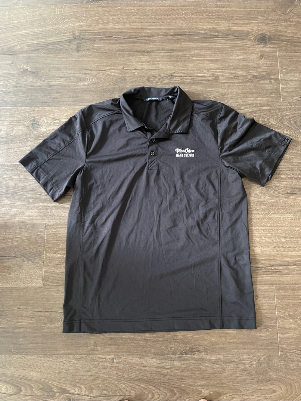 Men’s Black Short Sleeve Polo w/ Topo Chico Hard Seltzer Embroidery, Size Large